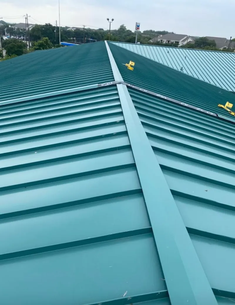 Green commercial metal roof ridge and valley for Metal Roof Repair in Sansom Park